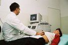 Doctor using ultrasound on patient FREE Stock Photo, diagnostic, health, examination table picture